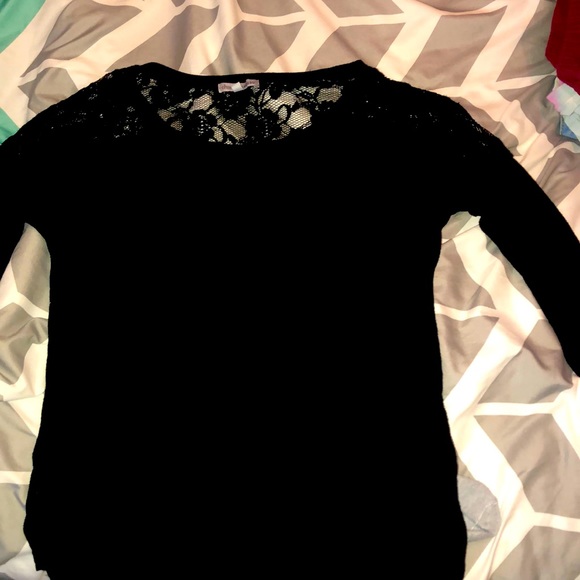 This here is a beautiful black dress shirt. - Picture 1 of 2